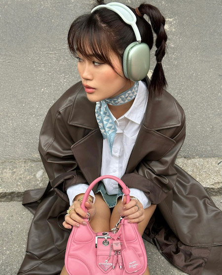 girl wearing headphones looking to the side